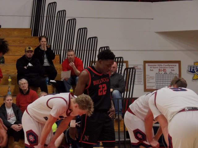 Basketball players on the court during a game